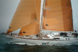 One of the magnificent Challenge yachts overtakes us in Southampton Water